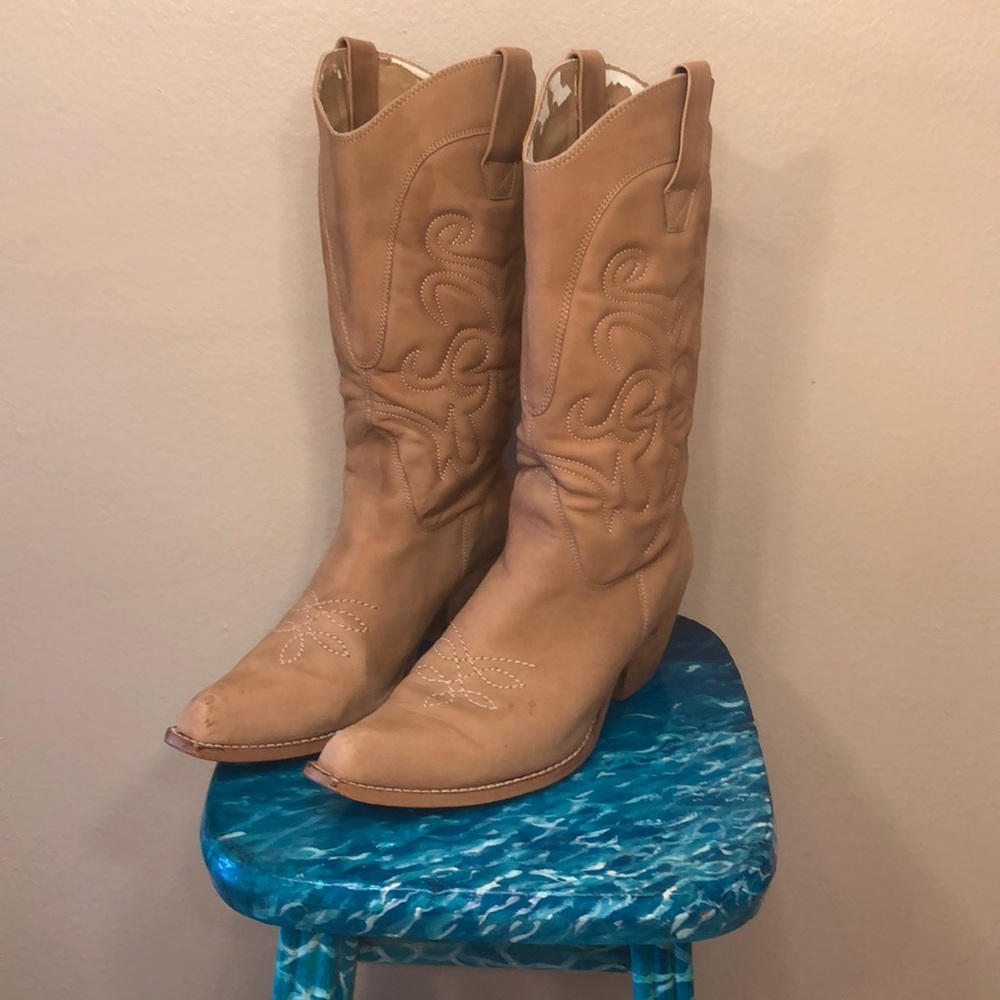 Tan woman’s cowboy boots